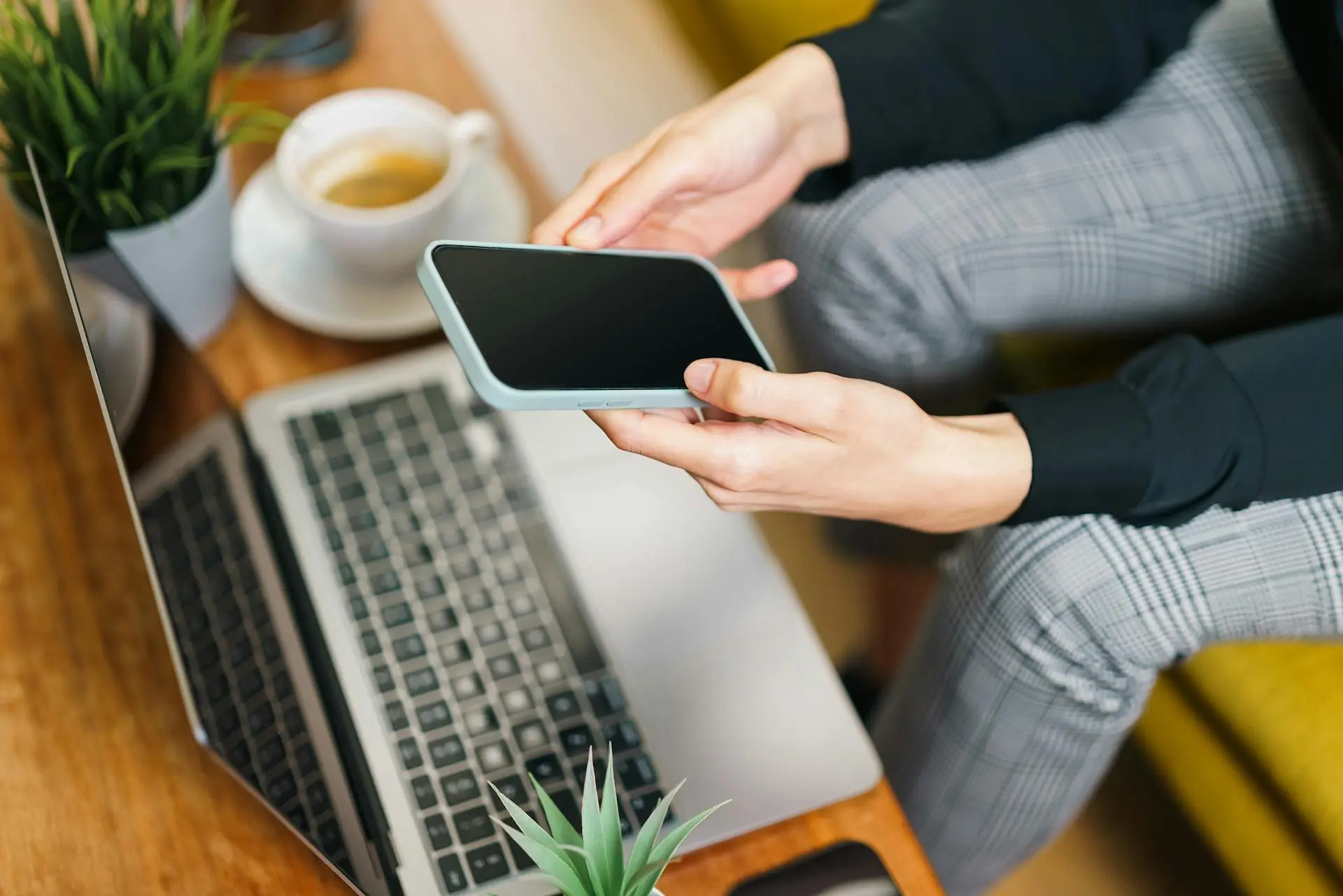 A real estate agent reviewing SEO keywords on a laptop