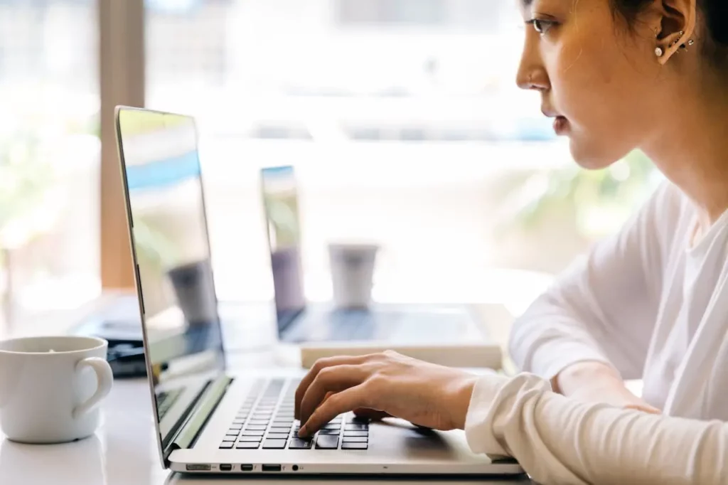 A real estate agent using email marketing analytics to improve campaigns