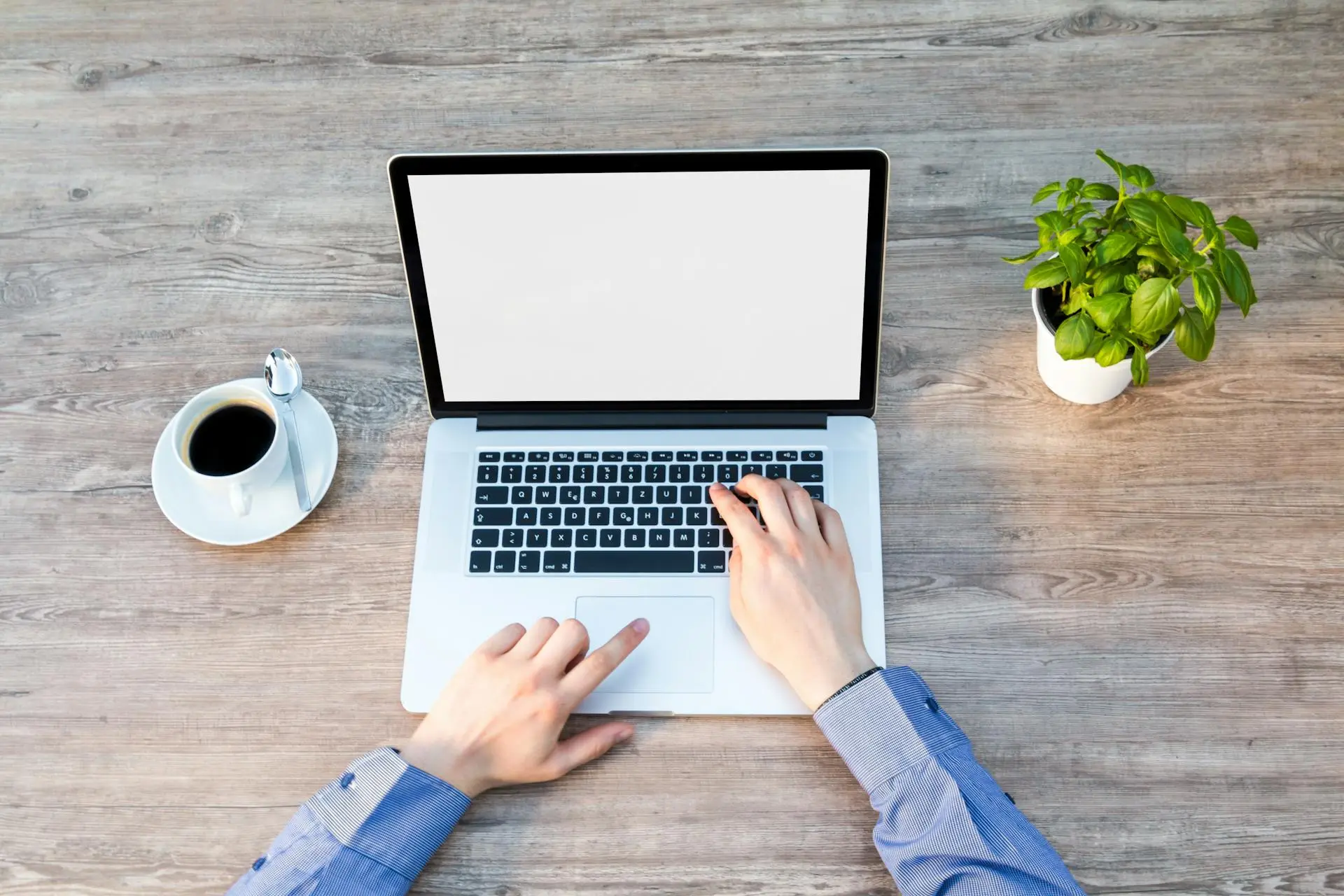 Realtor planning a social media schedule with content ideas displayed on a laptop