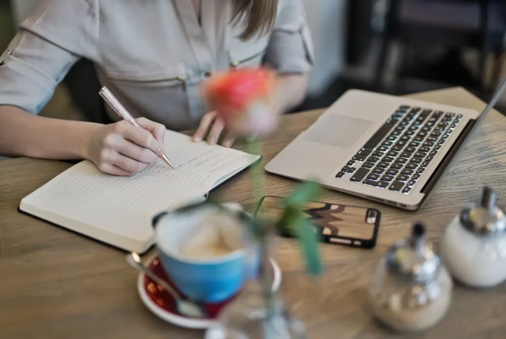 A realtor preparing a newsletter for past clients.