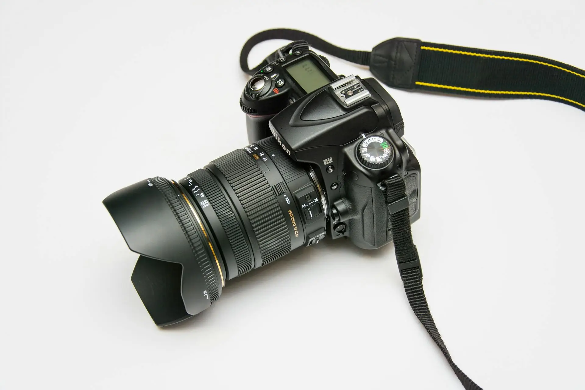 A realtor using a camera to create a virtual tour of a modern home