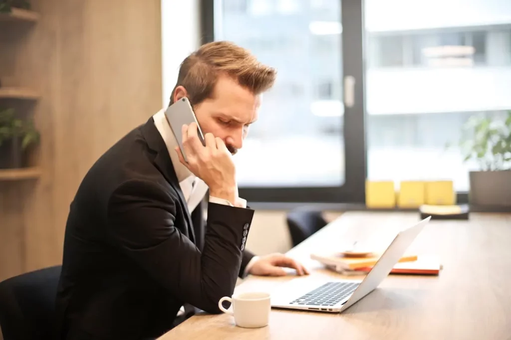 A real estate agent calling a past client to maintain a strong relationship.
