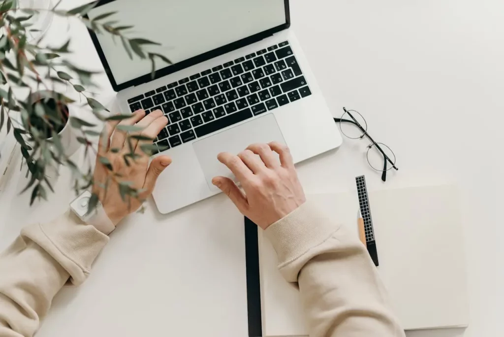 Realtor adjusting ad targeting settings for a PPC campaign