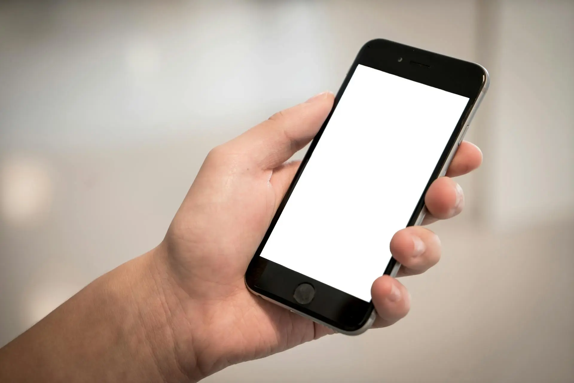 A real estate agent recording a property tour with a smartphone